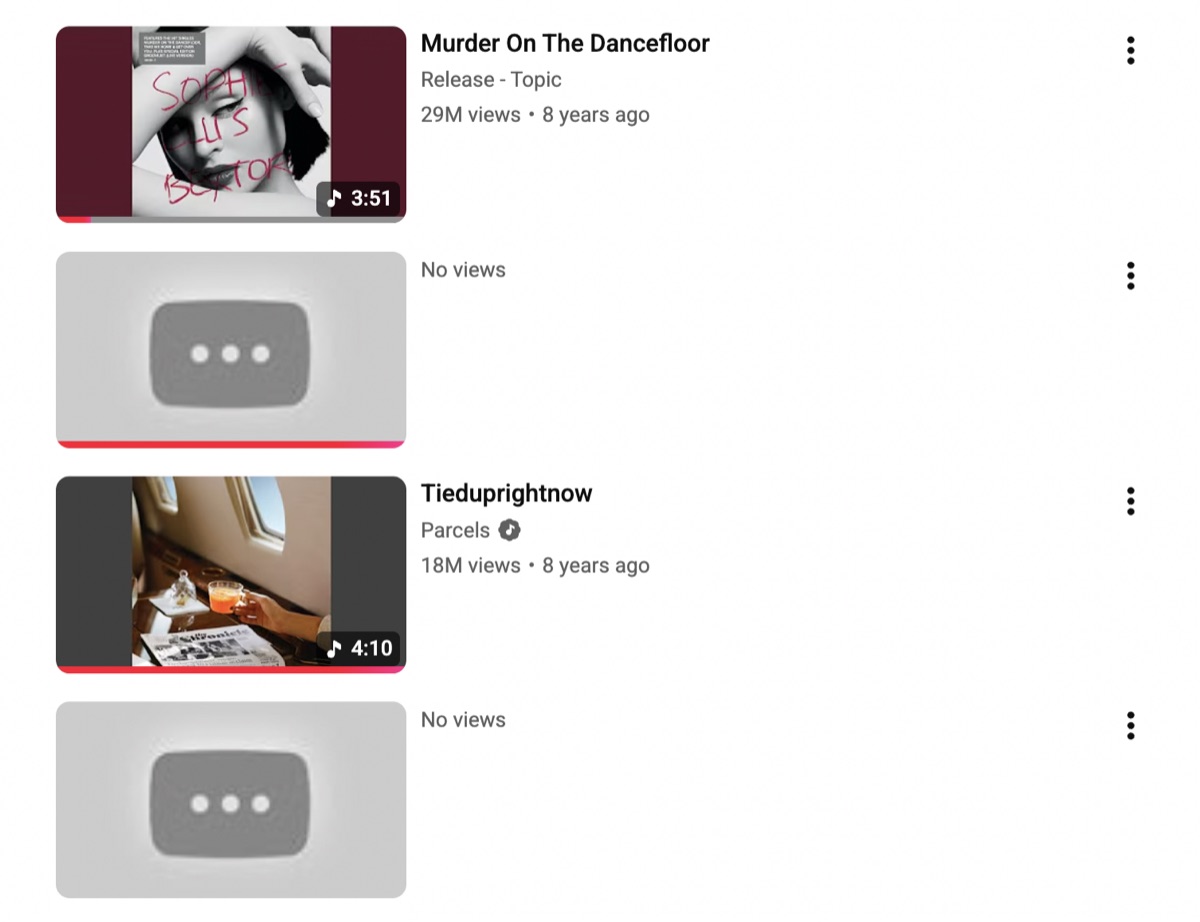 A YouTube playlist where two rows are blank: no thumbnail, no title, no artist.